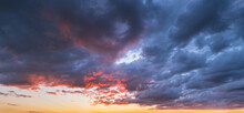 Clouds In Evening Dusk Sky Panoramic View. Climate, Environment And Weather Concept Sky Background.