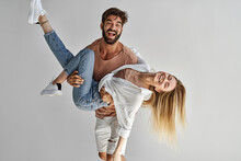 Young Sexy Couple Having Fun Expressing Positive Emotions