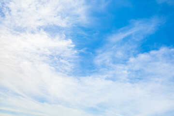 Wall Mural - beautiful and peaceful overcast sky with white clouds. abstract cloudscape floating in the air. soft