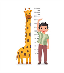 Wall Mural - Cute Little boy measuring height of his growth on the background of wall with giraffe