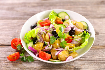 Canvas Print - mixed potato salad in bowl