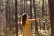 © Syda Productions - nature, spirituality and supernatural concept - young woman or witch performing magic ritual in forest