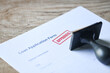 Loan approved on loan application form paper with rubber stamp on table, Loan approval business finance economy concept