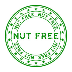 Sticker - Grunge green nut free word with star icon round rubber seal stamp on white background