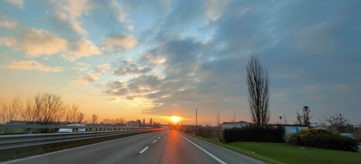 well sunset on italian highway