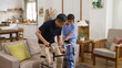 © PR Image Factory - asian Japanese older male stroke patient practicing using a walker with the assistance of his personal care attendant in the living room at home