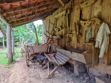 Old Farm Tools In A Barn In Southern Brazil