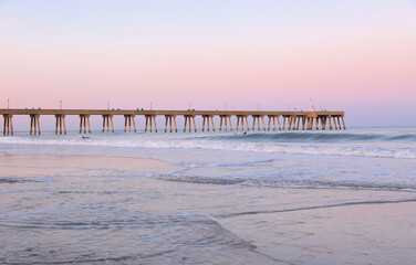 Wall Mural - Beautiful  sunset over Jennette's Pier , Nags Head North Carolina. Originally built in 1939, Jennette’s is the oldest fishing pier on the Outer Banks, NC USA