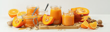 Concept Of Tasty Food, Pumpkin Jam And Ingredients On White Table