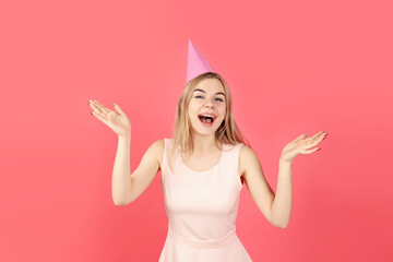 Wall Mural - Concept of Happy Birthday with attractive girl on pink background