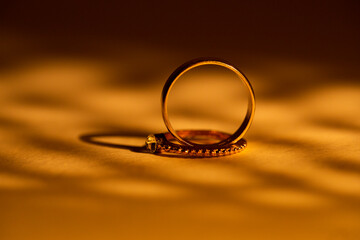 wedding rings on a mirror