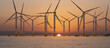 Offshore wind farm during sunrise