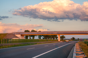 Wall Mural - empty highway during a spectacular sunset