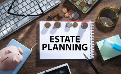 Sticker - Estate Planning on notepad with a coins and business objects.