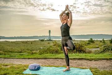 yoga in the morning at the beach