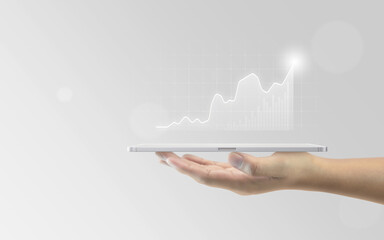 Wall Mural - tablet analysis business graph data diagram concept financial background with growth stock chart tra
