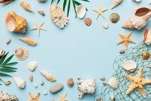 Summer Time Concept Flat Lay Composition With Beautiful Starfish And Sea Shells On Colored Table, Top View With Copy Space For Text