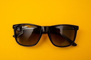 Sticker - Black s sunglasses on orange background