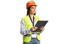 Young Female Site Engineer With A Safety Vest And Hardhat Looking To The Side