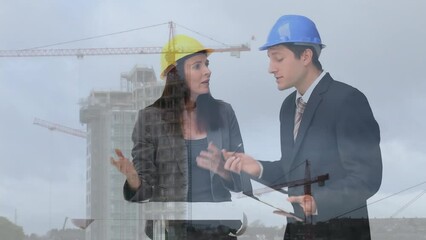 Wall Mural - Animation of a construction site over a group of caucasian engineers