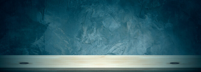 Wall Mural - An empty wooden table and concrete wall background can be used to display or montage your products.