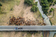 © Austockphoto - Horse drawn dray on bridge as cattle are mustered across the Burnett River near Eidsvold, QLD.
