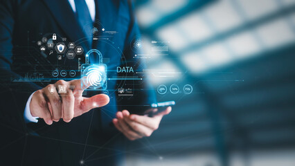 Wall Mural - businessman using fingerprints to access business information, biometric identification and cybersec