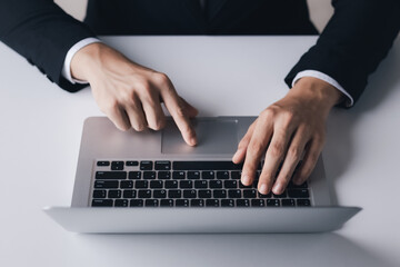 businessman working using laptop computers Liaise with customers and plan business strategies, working concepts using technology in the most efficient way.