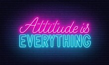Attitude Is Everything Neon Quote On A Brick Wall.