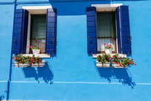 Close-up Of A Blue House With Bright Colors In Burano Island In A Sunny Spring Day. Venetian Lagoon, Venice, UNESCO World Heritage Site, Veneto, Italy, Southern Europe.