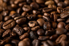 Background of roasted coffee beans with pleasant aroma