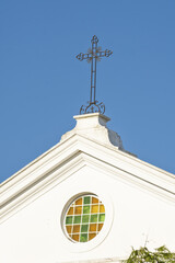 Wall Mural - Storks nesting on roof of church in Faro, Portugal