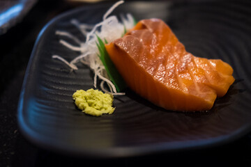 Wall Mural - Raw salmon slice or salmon sashimi in Japanese style