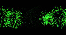 Image Of Green Christmas And New Year Fireworks Exploding On Black Background
