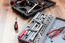 Tool Box. Toolset With Interior Compartments To Keep Wrenches, Ring Spanners, Hammer, Pliers, Screwdrivers, Monkey Wrenches, Screws, Bolts, Wire And Other Tools.
