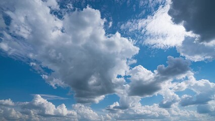 Wall Mural - Air plane window view time lapse clouds and blue sunny sky, Loop of white clouds over blue sky with sun Rays, Aerial view, drone shooting clouds motion time, nature blue sky a white cleat weather. 4K.