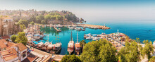 Aerial View Of The Picturesque Bay With Marina Port With Yachts Near The Old Town Of Kaleici In Antalya. Turkish Riviera And Resort Paradise
