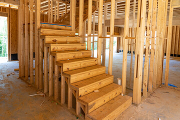 New house residential construction  framing with stairs.