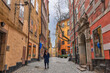 © Noppasinw - Stockholm Sweden, city skyline at Gamla Stan old town with woman tourist