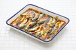 small fish escabeche ( deep fried horse mackerel marinated in spicy vinegar sauce )