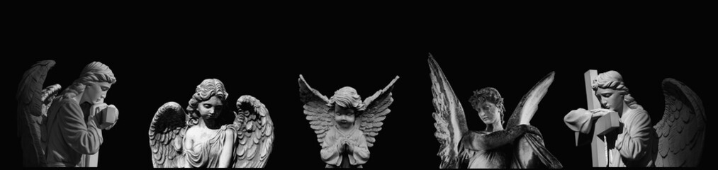Fototapete - Ancient angels against black background. Horizontal image.