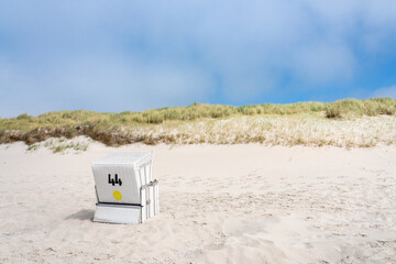 Wall Mural - summer holidays in a beach chair, north sea coast, sylt, germany