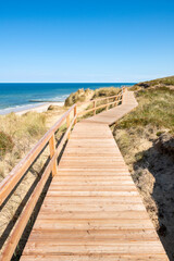 Wall Mural - wooden pier along the coast near kampen, sylt, schleswig-holstein, germany