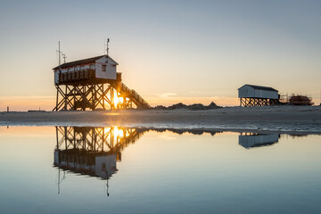 Wall Mural - stilt houses (pfahlbauten) near the north sea coast, sankt peter-ording, schleswig-holstein, germany