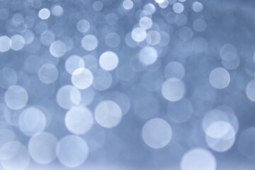 Wall Mural - abstract blurred gray and white bokeh background concept shiny blurred lights ,christmas background 
