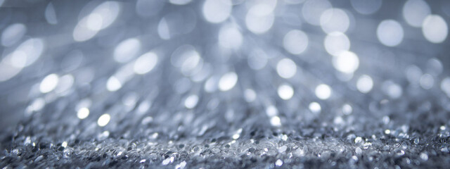Wall Mural - abstract blurred gray and white bokeh background concept shiny blurred lights ,christmas background 