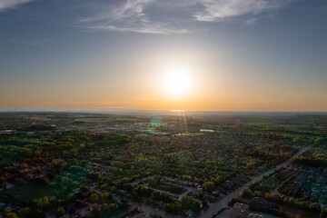 Wall Mural - Barrie suburbs sunset drone view  sun shining 