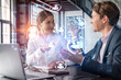 © VideoFlow - Businessman and businesswoman in formal wear working together looking for new employees to hire for international business consulting. HR, social media icons over modern panoramic office background