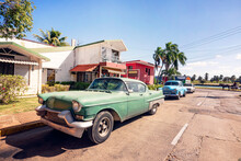 Green Classic Car Parked Near The Beach In Varadero Cuba. Retro Cars Of The 50s