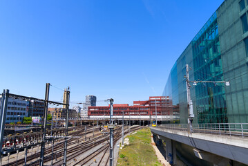 Facade of modern office building at railway station Basel SBB at City of Basel on a sunny spring day. Photo taken May 11th, 2022, Basel, Switzerland.